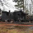 No injuries were reported at a morning house fire at 20 Mass Pike Lane. (Photo by Sarah Thompson)