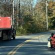 Michelle Bishop operates her powered wheelchair on John Street in November 2023