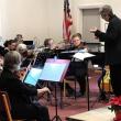 Conductor Deirdre McClure conducts orchestra. (Photo courtesy Penobscot Bay Orchestra)