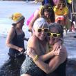 This hug at last year's “Love Ourselves” cold water dip exemplifies the love and community Finding Our Voices is bringing to Maine women with its February events, according to FOV, in a news release. Hugging at 2024’s Wander Women’s dip in Union are Carla Armbuster and Carol Miller. Back (l-r): Cathy Kelly, Kerry Hadley, Emily Peckham, and Laura Cabot. (Photo by Erja Lipponen)