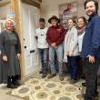 Midcoast Habitat for Humanity staff and volunteers stand in front of the memorial door honoring former President Jimmy Carter’s work with Habitat for Humanity. (L-R) Tia Anderson, Todd Look, Bob Newbest, Kristie Kosalski, Maggi Blue, and Dashiell Marley. (Photo courtesy Midcoast Habitat for Humanity)