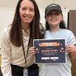 Aubree Joynt receives the Principal’s Award from Principal Ainslee Riley. (Photo courtesy Thomaston Grammar School)