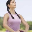 Woman breathing in