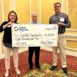 L - R: Becca Gildred-UMC Executive Director, Jim Hengerer-UMC Board Chair, and Cliff Winn-Executive Director of Coastal Opportunities. (Photo courtesy United Midcoast Charities)