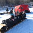 Members of Big Ash Sled practicing the full tuck. Photo by Kay Stephens