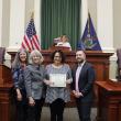 Front row, l-r: Rep. Karen Montell, D-Gardiner, Rep. Vicki Doudera, Anna Carpenter and House Speaker Ryan Fecteau. Back row: Rep. Kathy Javner, R-Chester. (Photo courtesy Maine Legislature House Democratic Office)
