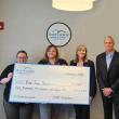 Bar Harbor Bank & Trust presents a donation from the Bank’s Casual for a Cause program to Pine Tree Society. Pictured L-R: Adria King, Chief Development Officer at Pine Tree Society; Nichole England, Branch Relationship Manager at BHBT; Suzanne Moffatt, SVP Senior Wealth Manager at Bar Harbor Wealth Management; and Chris Rugullies, SVP Regional Relationship Manager at BHBT.