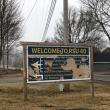 a dilapidated peeling sign greets visitors at RSU40 middle and high schools