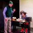 Steve (Eric Sanders, left) and Becky (Katie Glessner) chat in her office. (Photo by Gwyneth Sauvage)