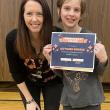 Autumn Morin receives the Principal’s Award from Principal Ainslee Riley. (Photo courtesy Thomaston Grammar School)