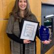 Julie LeBlanc stands with her Maine SAFE Award given by the Maine Coalition Against Sexual Assault (MECASA). (Photo courtesy MaineHealth)