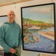 Stephen Florimbi stands next to his winning painting, “Coming and Going.” (Photo courtesy Maine Boats, Homes & Harbors)