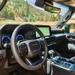 Today’s 250-Series Land Cruiser packs functionality, comfort and convenience into the sort of broad-shouldered and squared-off cabin that suits a brawny off-roader with decent street performance. The switches around the shift lever control the two-speed transfer case, the center and rear locking differentials and the e-brake.