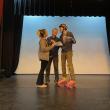 AnnMarie Lowerre, James Cook, and rollerskating Jack Sullivan rehearse for The Drowsy Chaperone. (Photo courtesy Watts Hall Community Players)