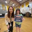 Norah Smith receives the Principal’s Award from Mrs. Riley. (Photo courtesy Thomaston Grammar School)