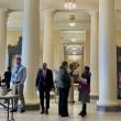 people gather in the halls of the statehouse