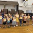 Creativity Award winners. Front: Evie Guite, Cameron Petty, Liam Eustis, Izalea Donnell-McLean, Aoife Miller, Azrael Dare. Back: Principal Ainslee Riley, Milo Fisher, Jack DeYoung, Carter Spicer, Colton Webber, Charlie Adams, LoriLei Grout, Quinn Blakeway, Marley Johnson, Evelyn Curtis. (Photo courtesy Thomaston Grammar School)