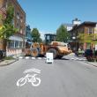 Heavy equipment is parked on Main Street at Glover's Passage as a preventative measure during the Sunday Stroll, June 15, 2025. (Photo by Sarah Thompson)