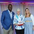 Patriots Pro Football Hall of Famer Andre Tippett (far left) and Gillette’s VP of Communications & Community Affairs, Global Grooming, Kara Buckley congratulate Maureen Keeley from The Center for Grieving Children for being selected as a 2025 Myra Kraft Community MVP Award winner. During the June 3 luncheon, the Kraft family, the Patriots Foundation and Gillette awarded $275,000 in grants to 26 New England nonprofits. The Center for Grieving Children received a $10,000 grant in honor of Maureen’s volunteer 
