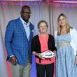 Patriots Pro Football Hall of Famer Andre Tippett (far left) and Gillette’s VP of Communications & Community Affairs, Global Grooming, Kara Buckley congratulate Cheryl Ramsay from NAMI Maine for being selected as a 2025 Myra Kraft Community MVP Award winner. During the June 3 luncheon, the Kraft family, the Patriots Foundation and Gillette awarded $275,000 in grants to 26 New England nonprofits. NAMI Maine received a $10,000 grant in honor of Cheryl’s volunteer efforts. (Photo courtesy Eric J. Adler/New Eng