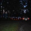 A narrow camp road is illuminated by taillights at 4:15 a.m. (Photo by Sarah Thompson)