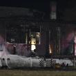 Flames that were initially only visible at two rear walls of 27 Westbrook Street quickly spread through the rest of the house, Saturday, Aug. 23, 2025. (Photo by Sarah Thompson)