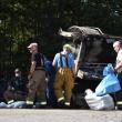 Fire crews mop up fluids from a truck fire incident. (Photo by Sarah Thompson)