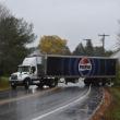 freightliner backing into parking lot to turn around