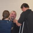 Eric Quatrano's children help with the pinning ceremony. (Photo by Sarah Thompson)