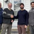 Steve Matteo, Jonathan M. Goss, Adam Pereira and Aaron Englander, at the real estate closing. (Photo Maine Coast Heritage Trust)
