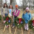 Four females in a cemetery