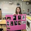Nora Smith holds picture tree 