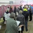 voters waiting in line to cast their ballot.