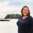 woman with harbor backdrop