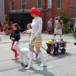 Bridget Matros, parade organizer, leads the procession. (photo by Erica Thoms)
