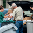 people filling bins