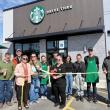 ribbon cutting in front of Starbucks