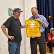 Town Administrator James Kossuth hands plaque to Amon Morse. (photo by Erica Thoms)