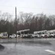 power trucks staging in a parking lot.