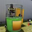 man at dunk tank seat