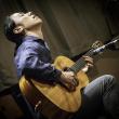 person playing guitar