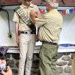 Scout receiving badge