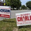 campaign signs for Troy Jackson and Bobby Charles.