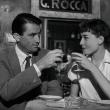 man woman have drinks at eatery