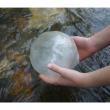 orb held above water