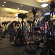 Media swarm (Photo by Michael Hurley)