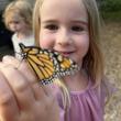 girl holding butterfly