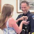 Allen Weaver, Jr., Camden Police Chief, and his wife, Kimberly, who pinned his new badge to his lapel,, July 13. (Photo courtesy Holly Anderson)