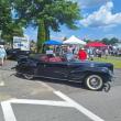 OHTM black sedan