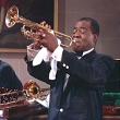 man plays trumpet
